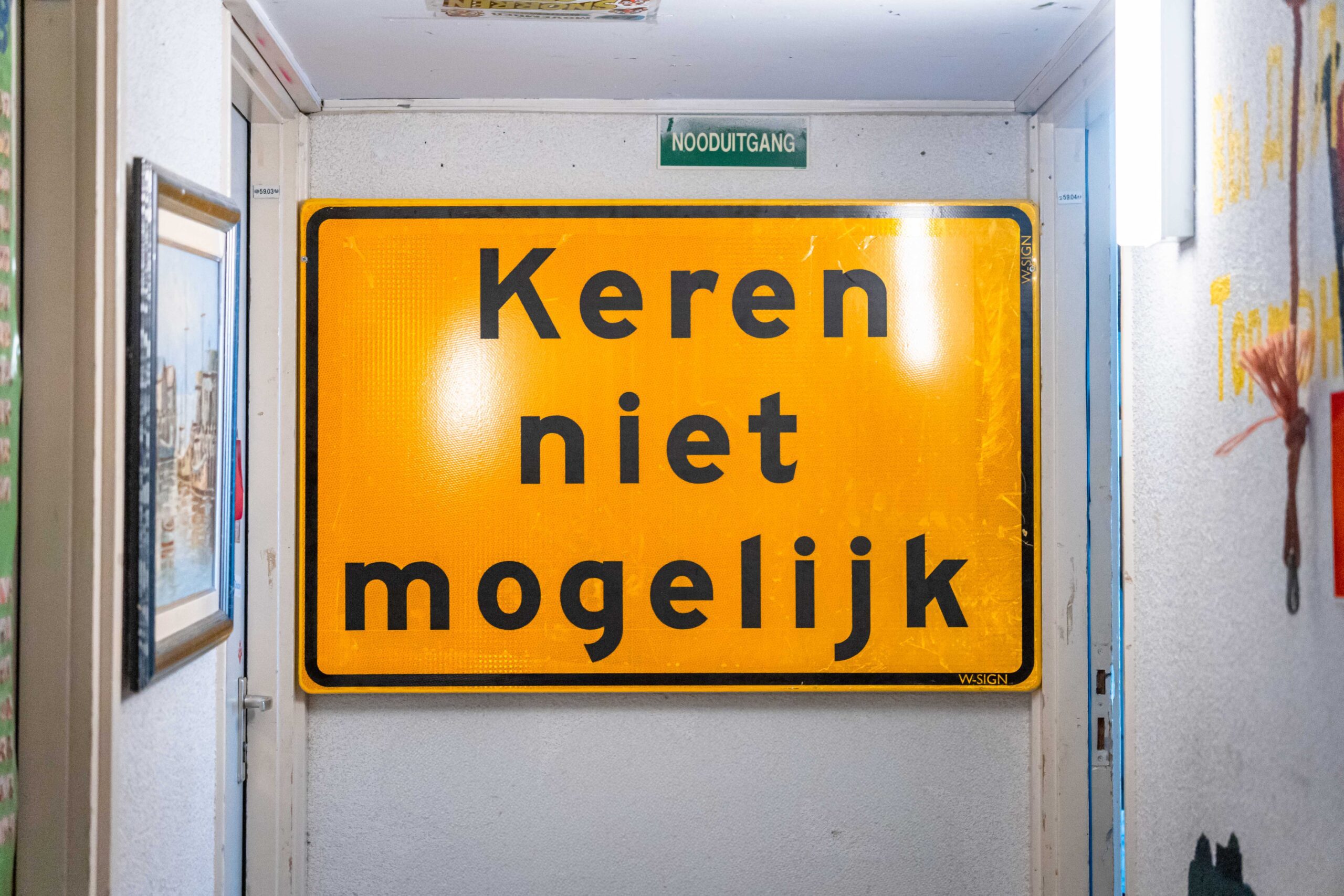 The huge 'Do not turn here' sign in Mick and Gijs's student house. Photo: Thijs van Reeuwijk